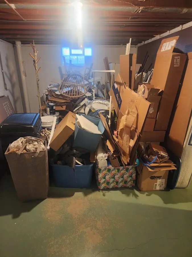 Roll-off dumpster container at job site for 15 Yard Dumpster Rental in Eatonton